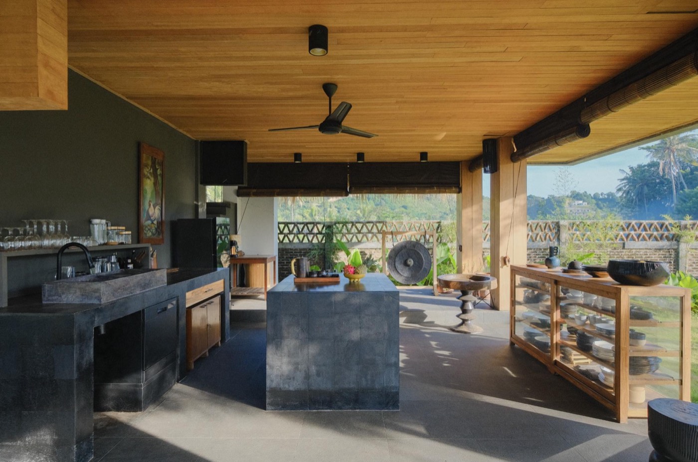 the open kitchen with a stone island